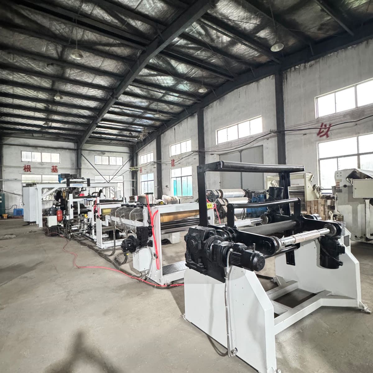 Used PET Sheet Extrusion Line Running PET Sheet: On-Site Thickness and Precision Inspection